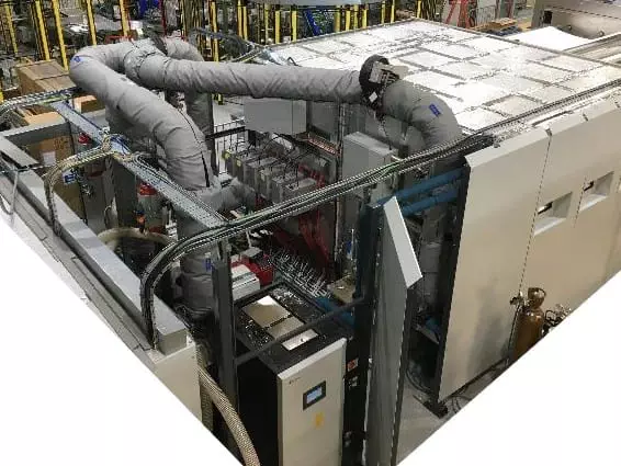 A Special Purpose Vacuum Coater